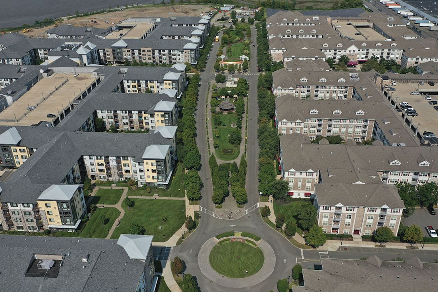 An aerial view of a landscaped commercial complex showing how commercial landscaping impacts property value