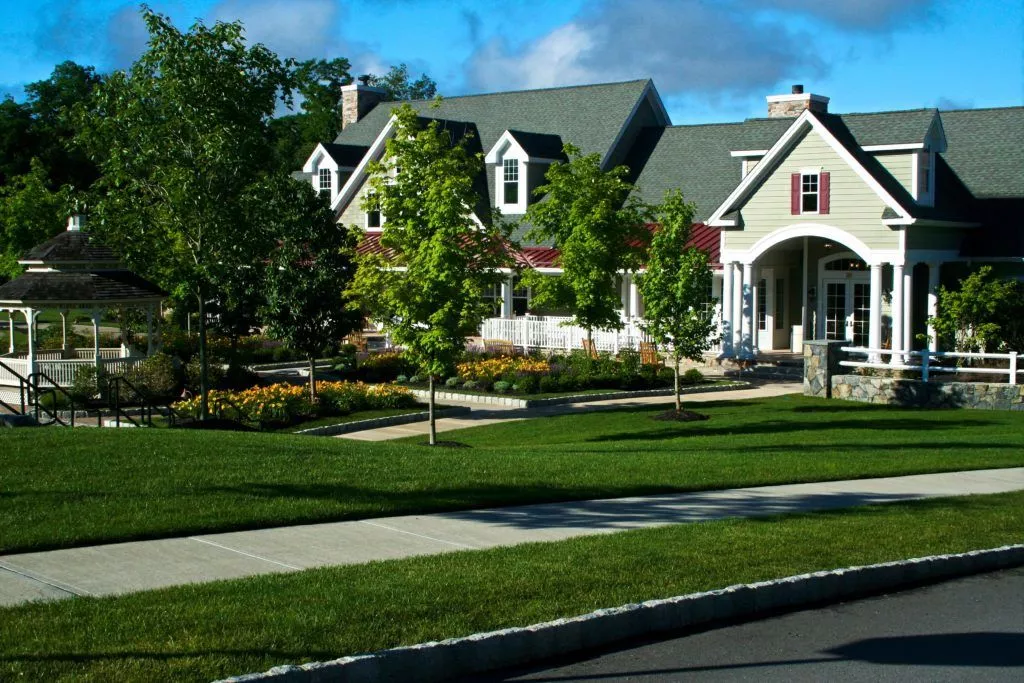 Beautiful front lawn concept image for commercial lawn maintenance.