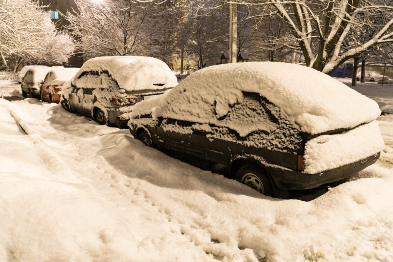 Snow storm of the Winter of 93 showing cars burred 